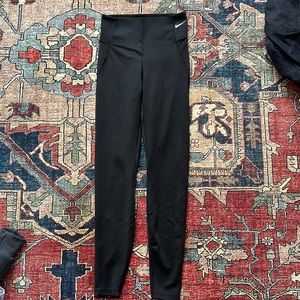 Black Nike leggings.